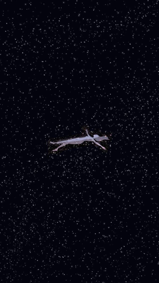 A figure floating weightless in a field of stars