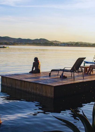 The dock on Lake Petén Itzá at sunset